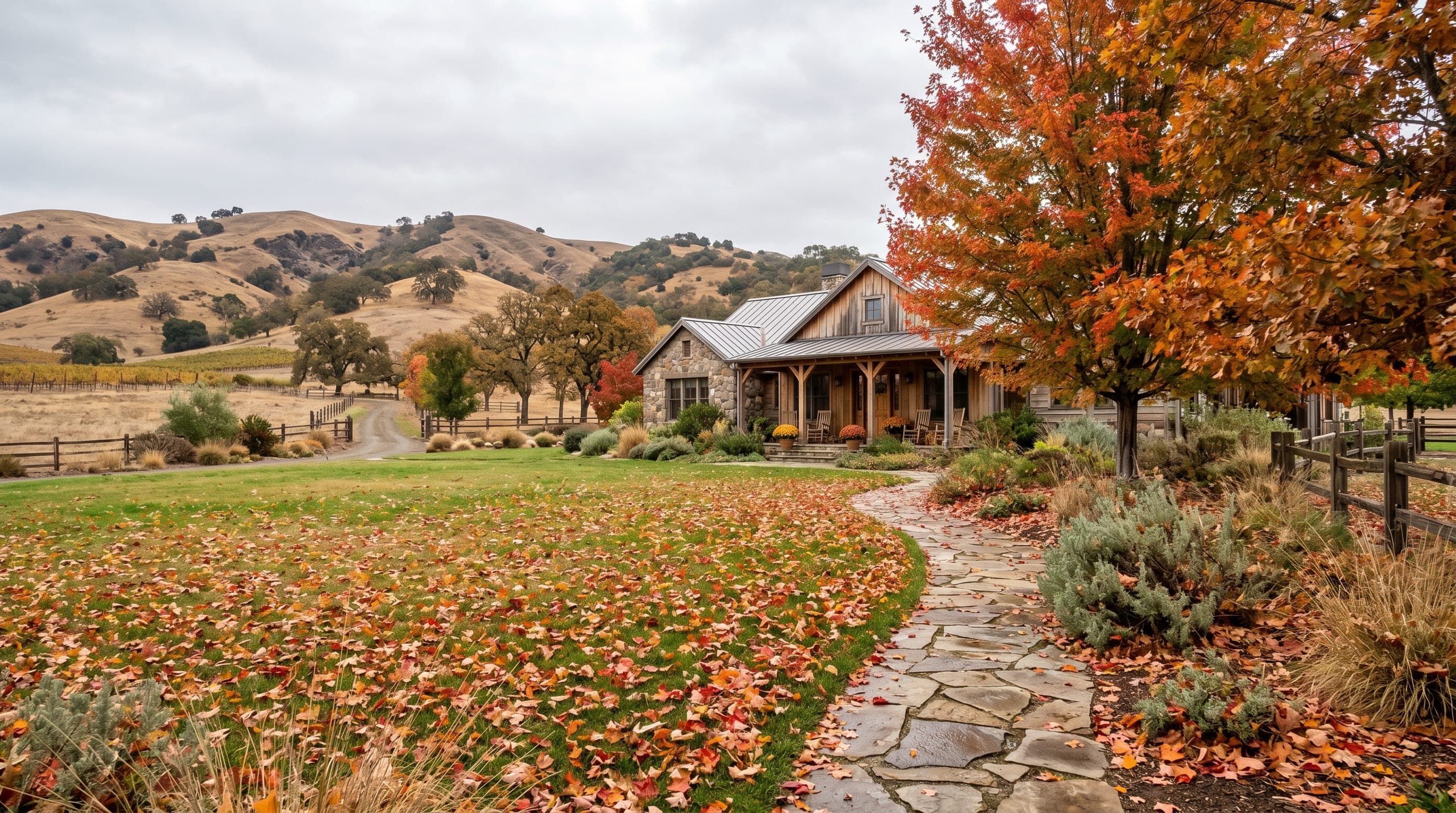 Rural North Bay property with stone path, seasonal lawn, hills, and open sky.